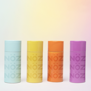 All of NÖZ reef safe and colorful nose sunscreen next to each other.